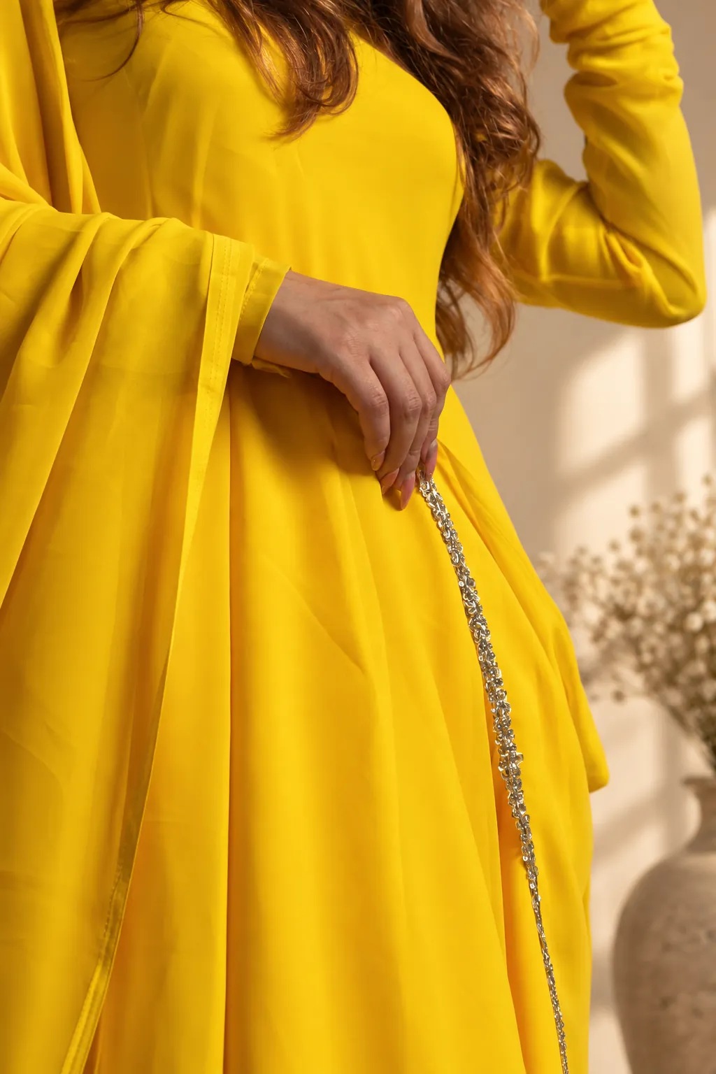 Close detail of the YUMRYIT signature garment